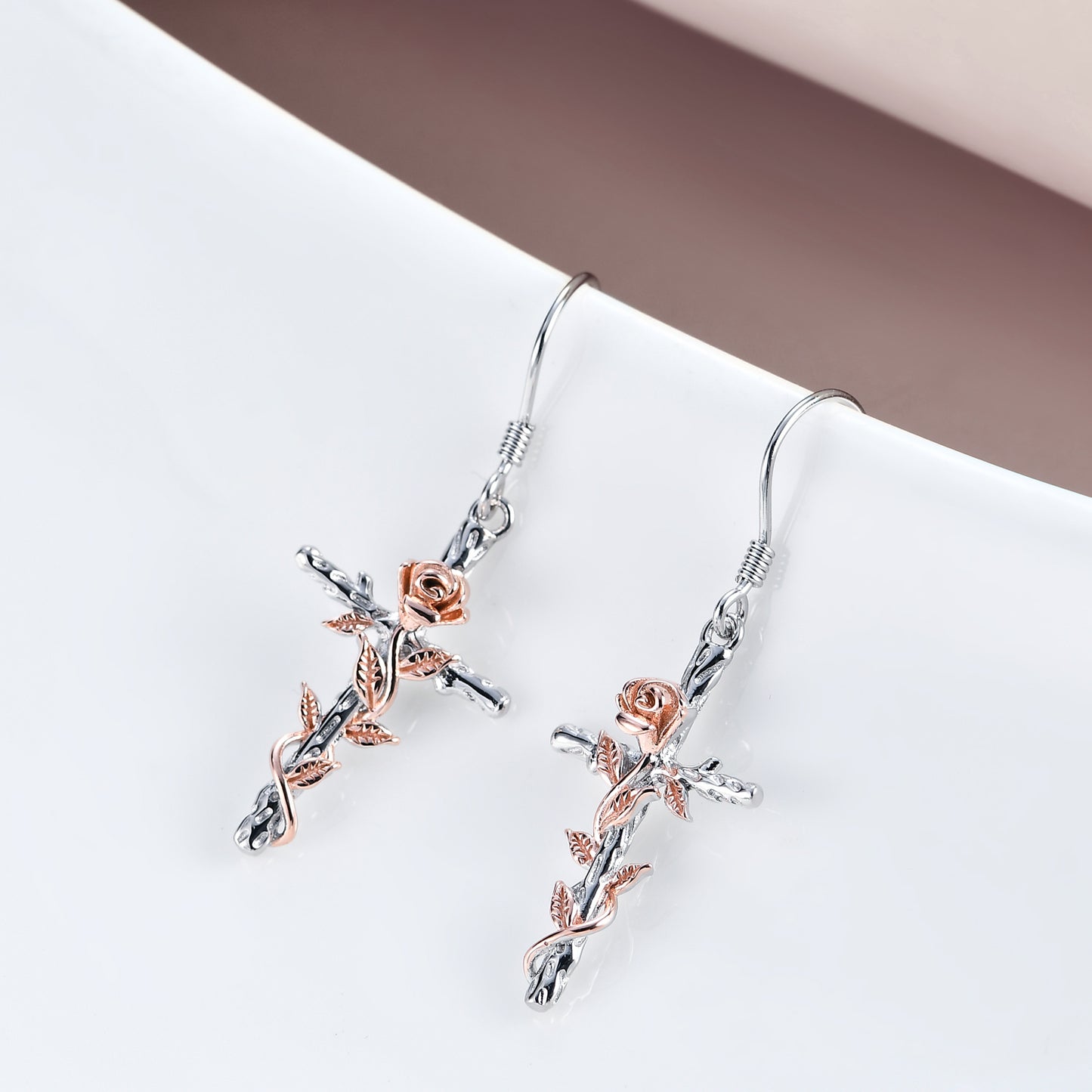 This Sterling Silver Rose Flower Cross  Dangling Earrings Jewelry is perfect for that lovely Christian lady in your life, to show her how much you care. The exquisite sterling silver design and intricate features makes these earring a special gift for Christmas, birthday, anniversary, Mother's Day or any occasion that you what to show her how much you enjoy her in your life.  Spoil yourself and get you a set of these earrings too, you deserve it.
