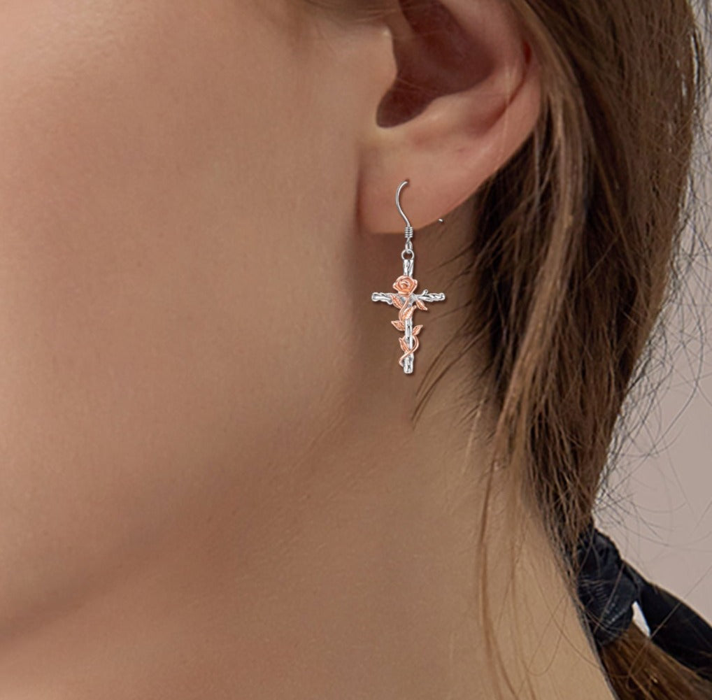 This Sterling Silver Rose Flower Cross  Dangling Earrings Jewelry is perfect for that lovely Christian lady in your life, to show her how much you care. The exquisite sterling silver design and intricate features makes these earring a special gift for Christmas, birthday, anniversary, Mother's Day or any occasion that you what to show her how much you enjoy her in your life.  Spoil yourself and get you a set of these earrings too, you deserve it.